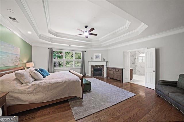 1323 Frey Lake Ct NW, Kennesaw, GA 30144 - bedroom with ornamental molding, a tray ceiling, wood finished floors, a high end fireplace, and ensuite bathroom
