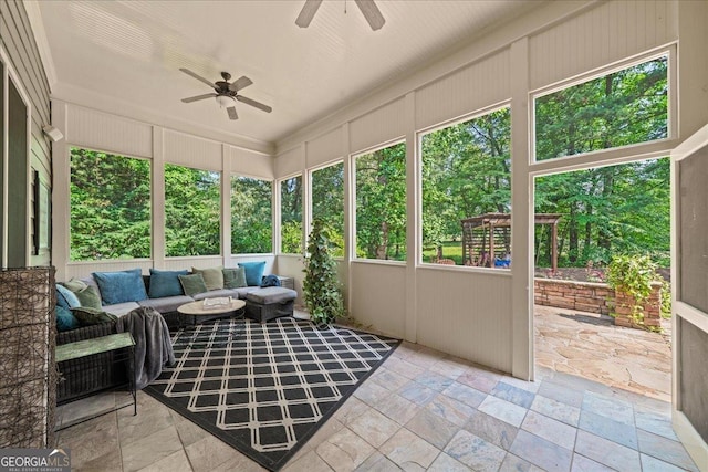 1323 Frey Lake Ct NW, Kennesaw, GA 30144 - sunroom with a ceiling fan, an outdoor hangout area, and healthy amount of natural light