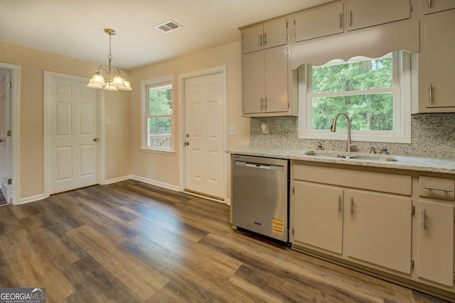 170 Hidden Pines Dr, Covington, GA 30016 - kitchen featuring stainless steel dishwasher, a sink, backsplash, a chandelier, and dark wood-style flooring