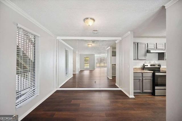 5555 Mountain Springs Cir, Stone Mountain, GA 30088 - hallway with ornamental molding, dark wood finished floors, and a textured ceiling