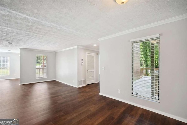 5555 Mountain Springs Cir, Stone Mountain, GA 30088 - spare room with a textured ceiling, dark wood-type flooring, and crown molding