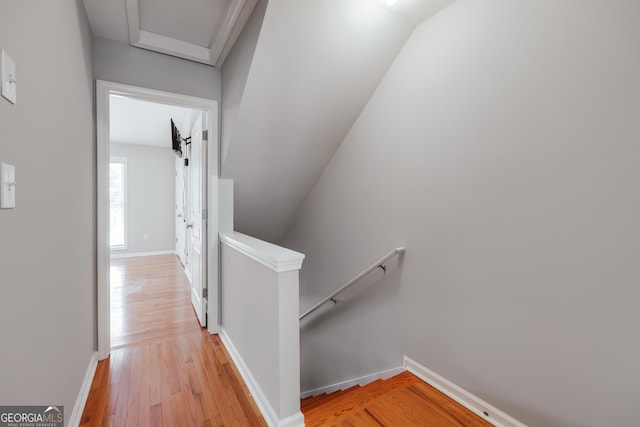 660 Barnett Shoals Rd Unit 127, Athens, GA 30605 - hall with an upstairs landing, light wood-style flooring, and baseboards