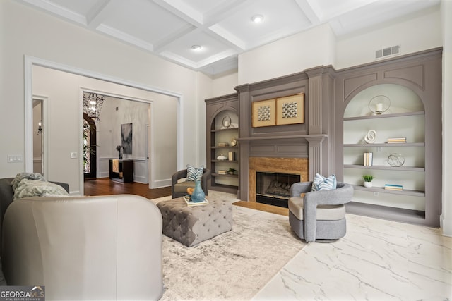 10630 N Edgewater Pl, Johns Creek, GA 30097 - living area featuring a high end fireplace, coffered ceiling, built in features, beam ceiling, and baseboards