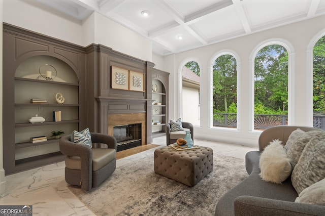 10630 N Edgewater Pl, Johns Creek, GA 30097 - living room featuring light marble finish flooring, coffered ceiling, built in shelves, a fireplace, and beam ceiling