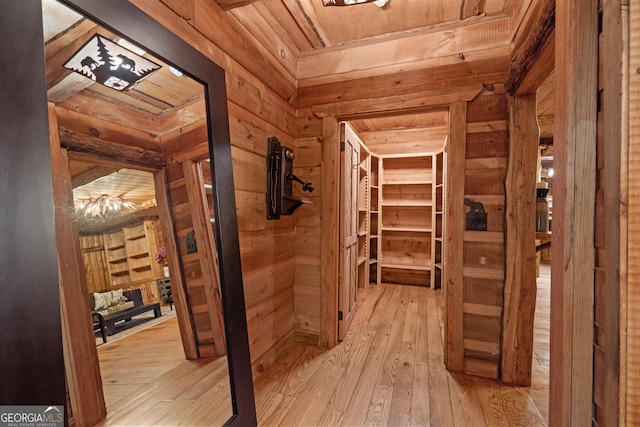 10630 N Edgewater Pl, Johns Creek, GA 30097 - hall featuring wooden walls and light wood-style flooring