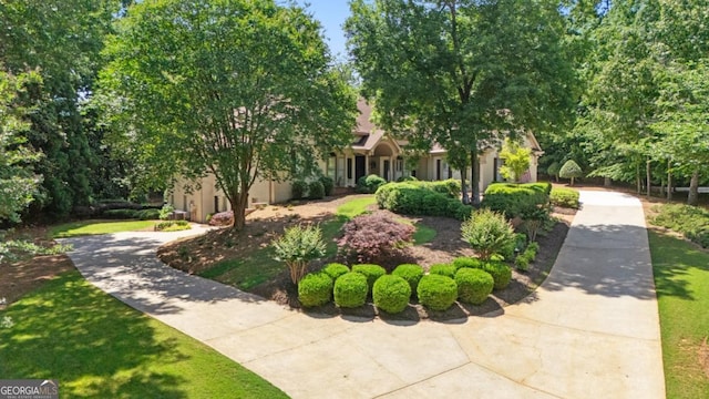 10630 N Edgewater Pl, Johns Creek, GA 30097 - view of front facade featuring stucco siding