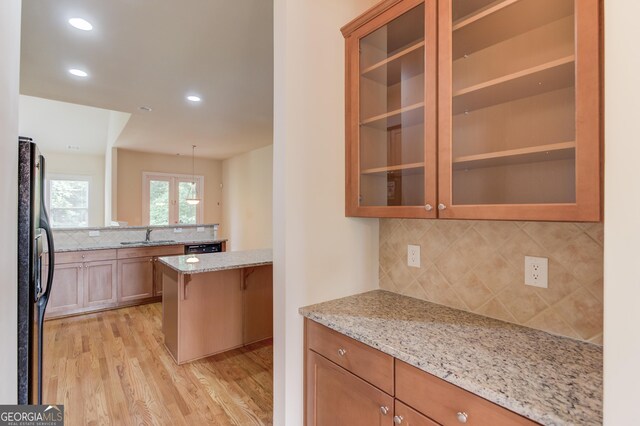 764 Morganton Dr, Johns Creek, GA 30024 - kitchen featuring freestanding refrigerator, tasteful backsplash, light wood-type flooring, light stone counters, and recessed lighting
