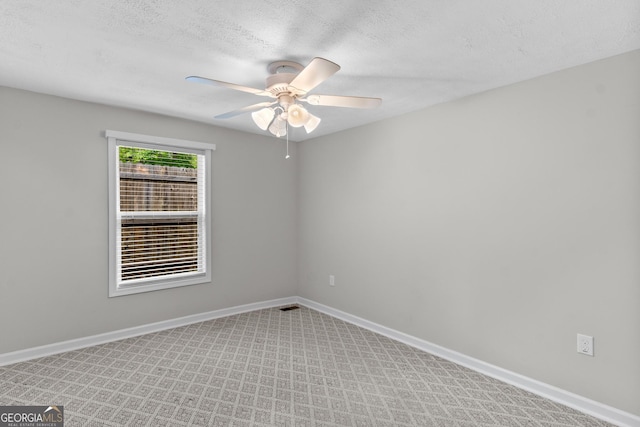 160 Birch Rd, Covington, GA 30014 - unfurnished room featuring a ceiling fan, light colored carpet, baseboards, and a textured ceiling