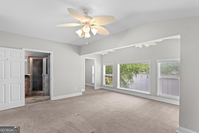 160 Birch Rd, Covington, GA 30014 - unfurnished bedroom featuring carpet floors, baseboards, lofted ceiling, ceiling fan, and ensuite bath