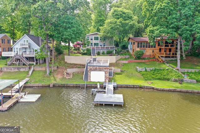 160 Birch Rd, Covington, GA 30014 - dock with stairway, a deck with water view, and a lawn