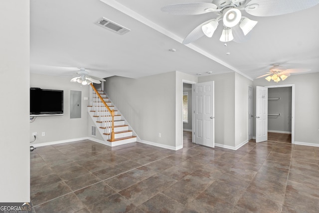 160 Birch Rd, Covington, GA 30014 - unfurnished living room with ceiling fan, stairway, and baseboards