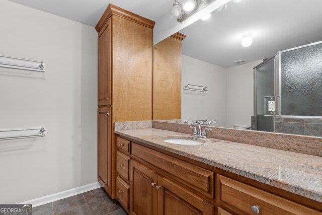 160 Birch Rd, Covington, GA 30014 - bathroom with a shower stall, baseboards, and vanity