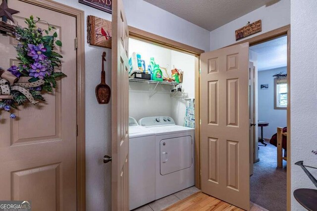 284 Summit Way Unit 19, Blairsville, GA 30512 - laundry room featuring washing machine and clothes dryer and light wood-type flooring