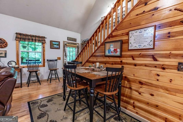284 Summit Way Unit 19, Blairsville, GA 30512 - dining room featuring stairs, vaulted ceiling, and wood finished floors