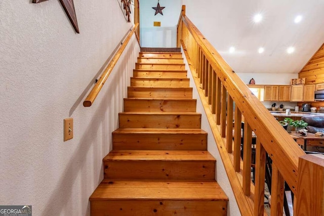284 Summit Way Unit 19, Blairsville, GA 30512 - staircase with recessed lighting, a textured wall, and vaulted ceiling