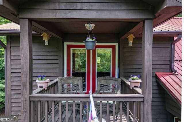 284 Summit Way Unit 19, Blairsville, GA 30512 - view of exterior entry featuring a metal roof and covered porch