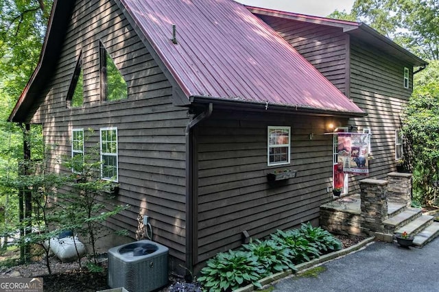 284 Summit Way Unit 19, Blairsville, GA 30512 - view of home's exterior featuring a cooling unit and a metal roof