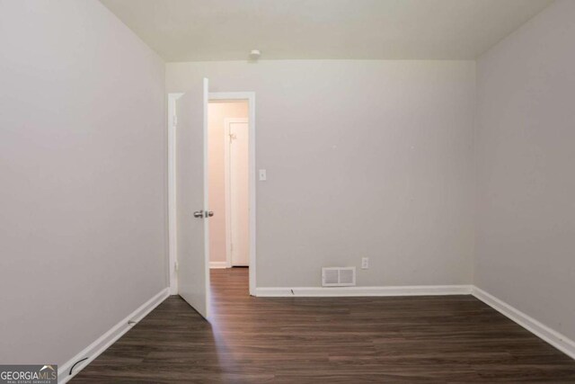 2311 Cherry Blossom Dr SW, Atlanta, GA 30331 - empty room featuring dark wood-style flooring and baseboards