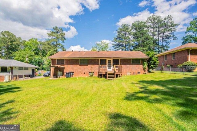 2311 Cherry Blossom Dr SW, Atlanta, GA 30331 - back of house featuring a wooden deck and brick siding