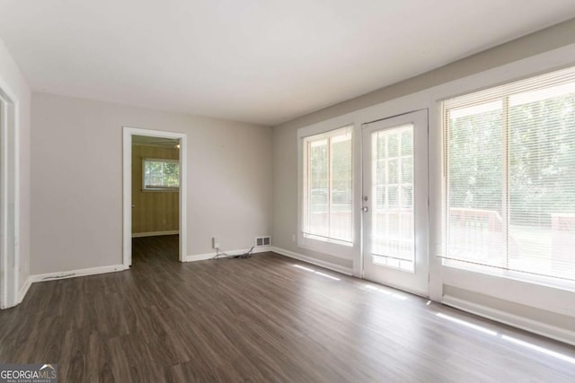 2311 Cherry Blossom Dr SW, Atlanta, GA 30331 - empty room with dark wood finished floors and baseboards