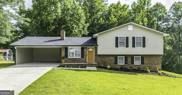 275 Timber Ridge Trl, Carrollton, GA 30117 - tri-level home featuring brick siding, driveway, a chimney, and a front lawn