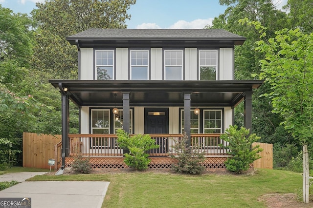 1158 Welch St SW, Atlanta, GA 30310 - view of front of property with board and batten siding, covered porch, and roof with shingles