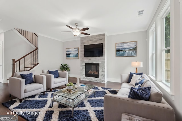 1158 Welch St SW, Atlanta, GA 30310 - living room featuring wood finished floors, crown molding, plenty of natural light, stairway, and ceiling fan
