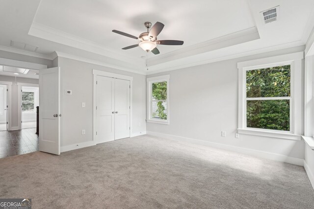 1158 Welch St SW, Atlanta, GA 30310 - unfurnished bedroom featuring a raised ceiling, attic access, carpet floors, crown molding, and a closet