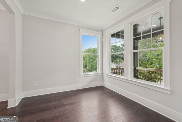 1158 Welch St SW, Atlanta, GA 30310 - unfurnished room with ornamental molding and dark wood-style floors