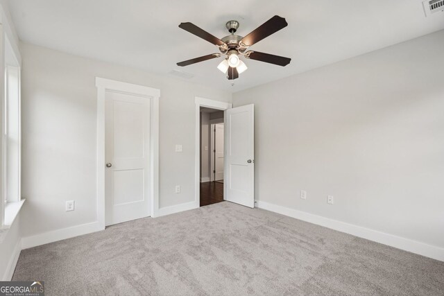 1158 Welch St SW, Atlanta, GA 30310 - unfurnished bedroom featuring carpet floors and ceiling fan
