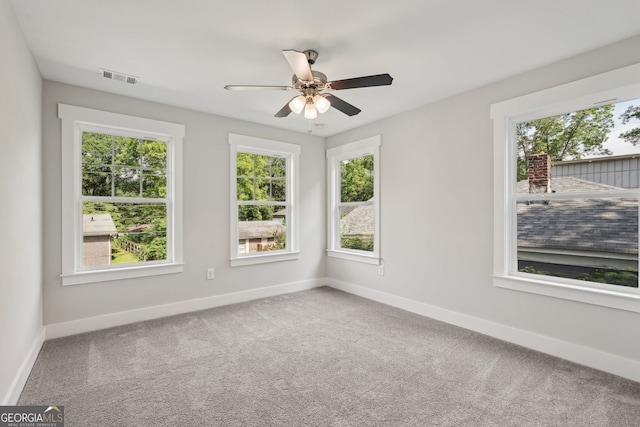 1158 Welch St SW, Atlanta, GA 30310 - spare room with plenty of natural light, carpet, and a ceiling fan