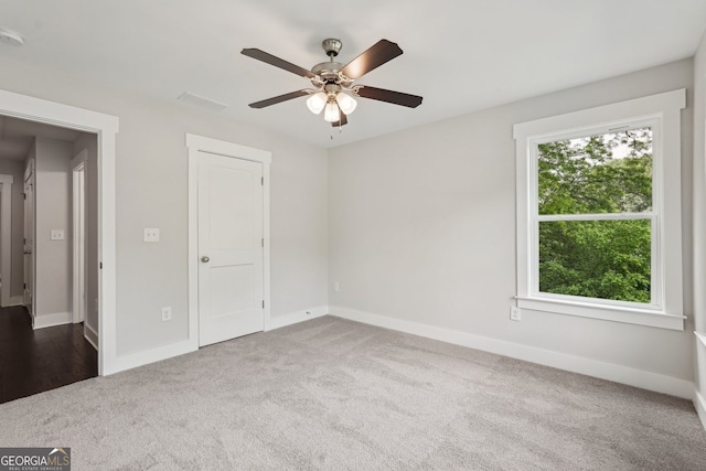 1158 Welch St SW, Atlanta, GA 30310 - unfurnished bedroom with carpet floors and ceiling fan