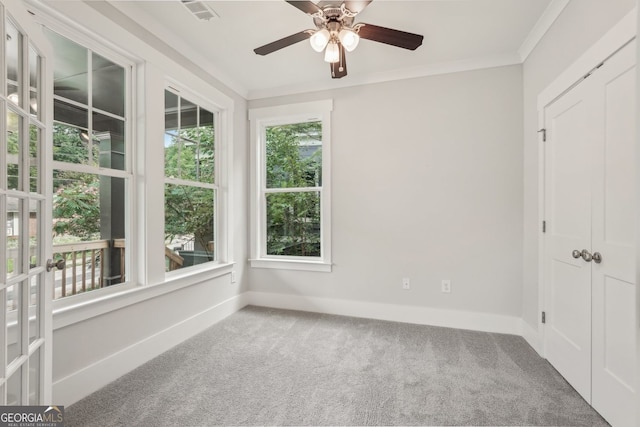 1158 Welch St SW, Atlanta, GA 30310 - carpeted empty room featuring a ceiling fan and crown molding