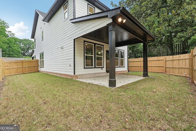 1158 Welch St SW, Atlanta, GA 30310 - back of property with a patio and a fenced backyard