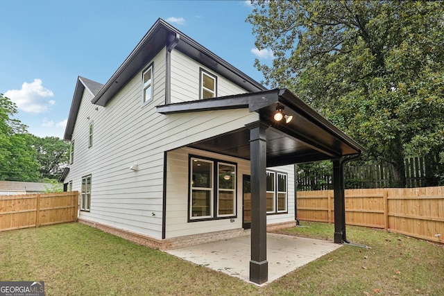 1158 Welch St SW, Atlanta, GA 30310 - back of house with a fenced backyard and a patio area