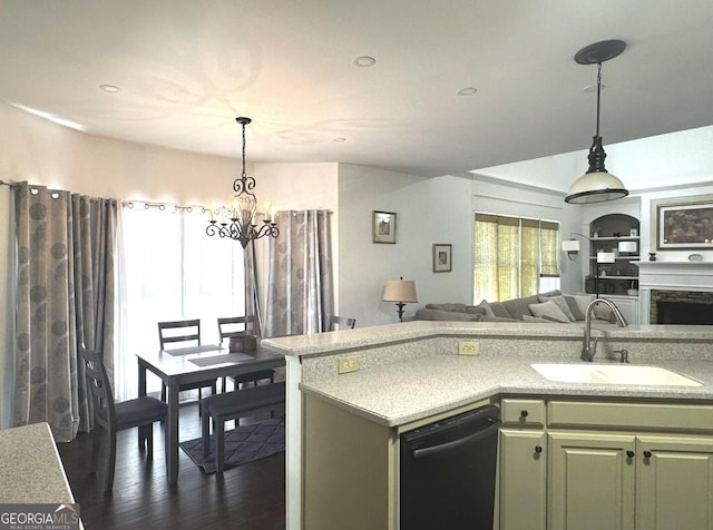 2674 Misty Rock Cv, Dacula, GA 30019 - kitchen with a sink, dishwasher, a chandelier, light countertops, and open floor plan