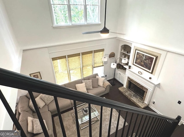 2674 Misty Rock Cv, Dacula, GA 30019 - living area with a fireplace and a towering ceiling