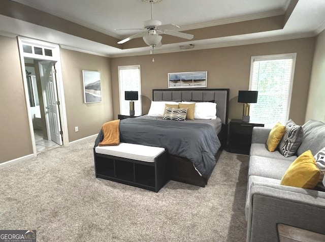 2674 Misty Rock Cv, Dacula, GA 30019 - bedroom with a tray ceiling, carpet floors, crown molding, baseboards, and ceiling fan