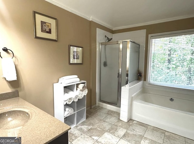 2674 Misty Rock Cv, Dacula, GA 30019 - full bathroom featuring a stall shower, ornamental molding, vanity, and a bath
