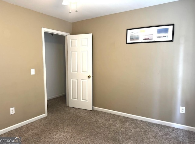 2674 Misty Rock Cv, Dacula, GA 30019 - unfurnished bedroom with carpet and baseboards