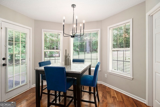 1478 Interlaken Pass, Jonesboro, GA 30238 - dining area featuring a chandelier and dark wood-type flooring