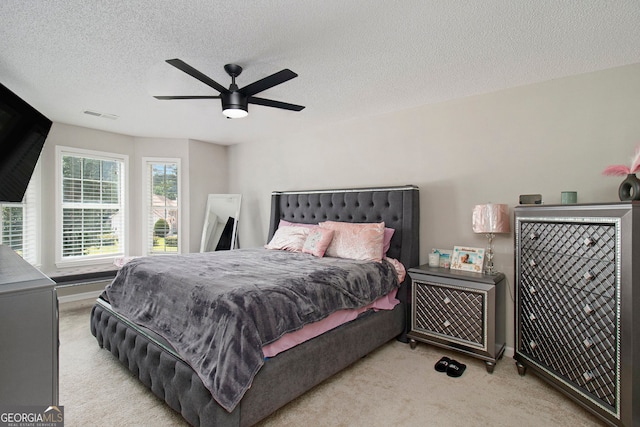1478 Interlaken Pass, Jonesboro, GA 30238 - bedroom with carpet, a textured ceiling, and ceiling fan