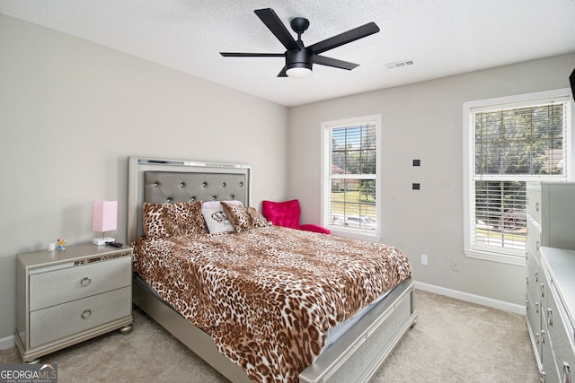 1478 Interlaken Pass, Jonesboro, GA 30238 - bedroom featuring light carpet, a ceiling fan, and a textured ceiling