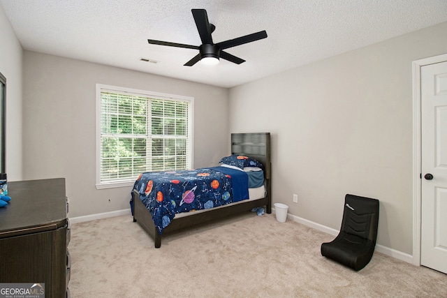 1478 Interlaken Pass, Jonesboro, GA 30238 - carpeted bedroom with ceiling fan and a textured ceiling