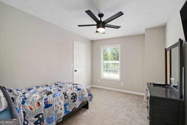 1478 Interlaken Pass, Jonesboro, GA 30238 - bedroom with light carpet, a textured ceiling, and a ceiling fan