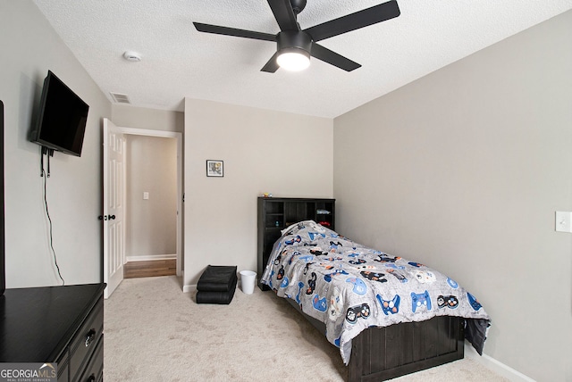 1478 Interlaken Pass, Jonesboro, GA 30238 - carpeted bedroom with ceiling fan and a textured ceiling
