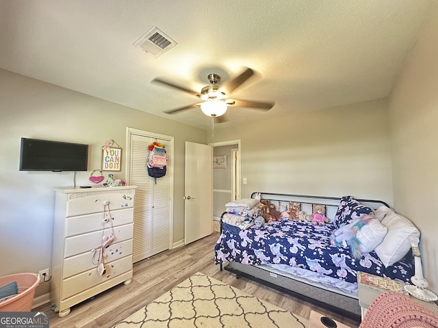 1815 Oak Spring St, Statham, GA 30666 - bedroom featuring light wood-style floors, a ceiling fan, baseboards, and a closet
