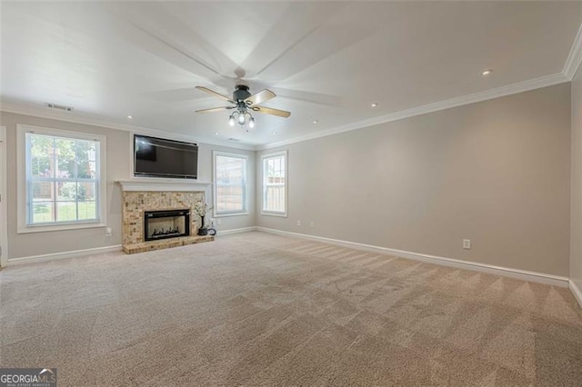 2304 Mitford Ct, Dacula, GA 30019 - unfurnished living room featuring a ceiling fan, ornamental molding, baseboards, light colored carpet, and a brick fireplace