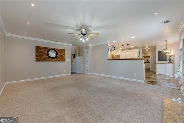 2304 Mitford Ct, Dacula, GA 30019 - unfurnished living room with ornamental molding, light carpet, baseboards, recessed lighting, and ceiling fan