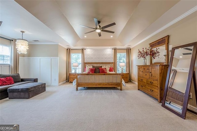 2304 Mitford Ct, Dacula, GA 30019 - bedroom featuring a tray ceiling, carpet floors, a chandelier, multiple windows, and ornamental molding